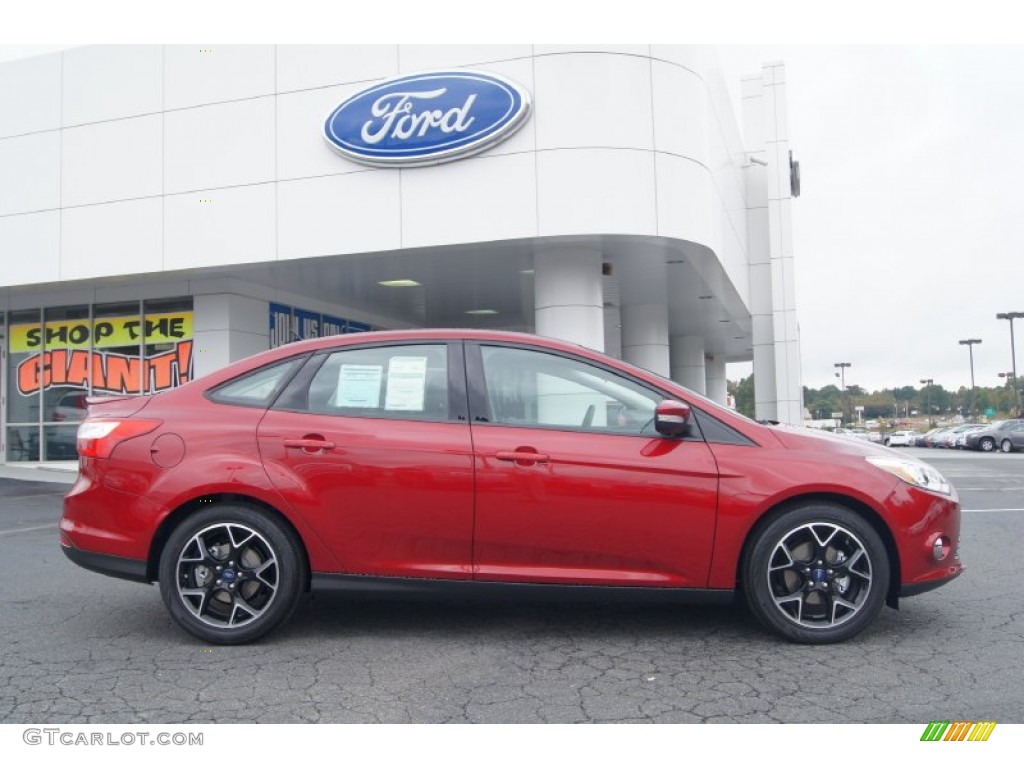 Ruby Red 2013 Ford Focus SE Sedan Exterior Photo #72222128