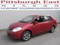 2011 Red Brick Nissan Versa 1.8 S Sedan  photo #1