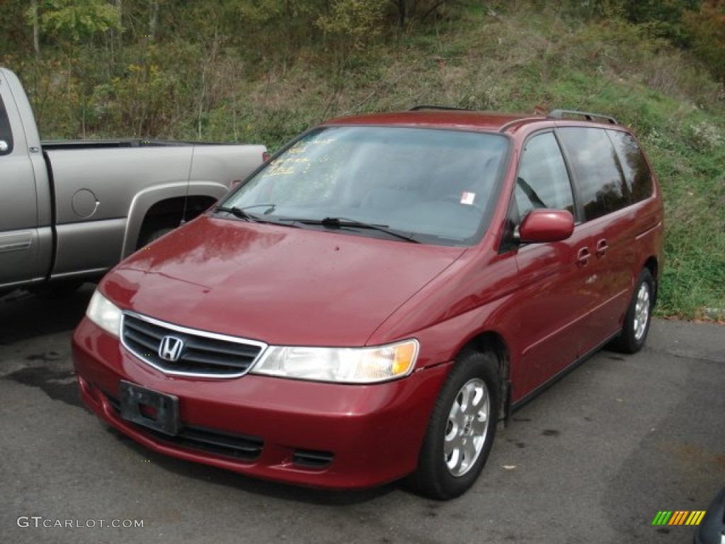 Red Rock Pearl Honda Odyssey