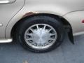 1999 Ford Taurus SE Wheel and Tire Photo