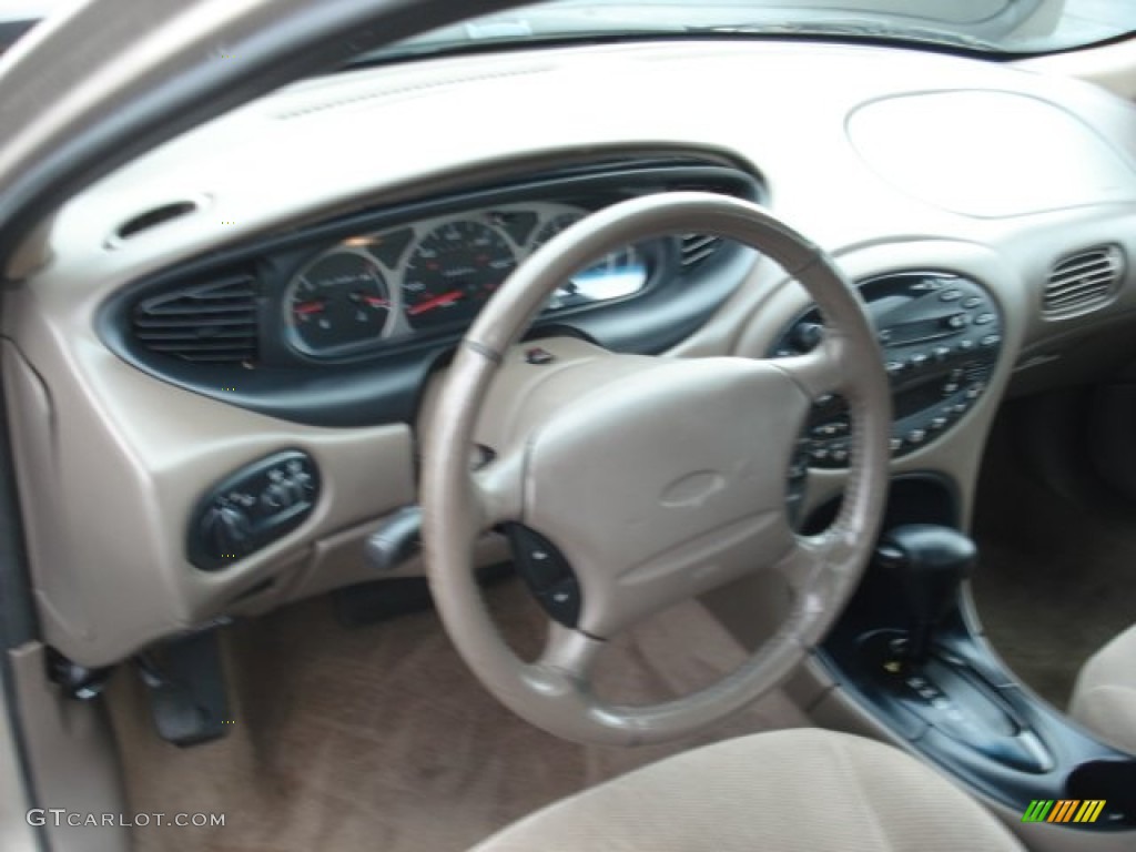 1999 Taurus SE - Light Prairie Tan Metallic / Medium Prairie Tan photo #8