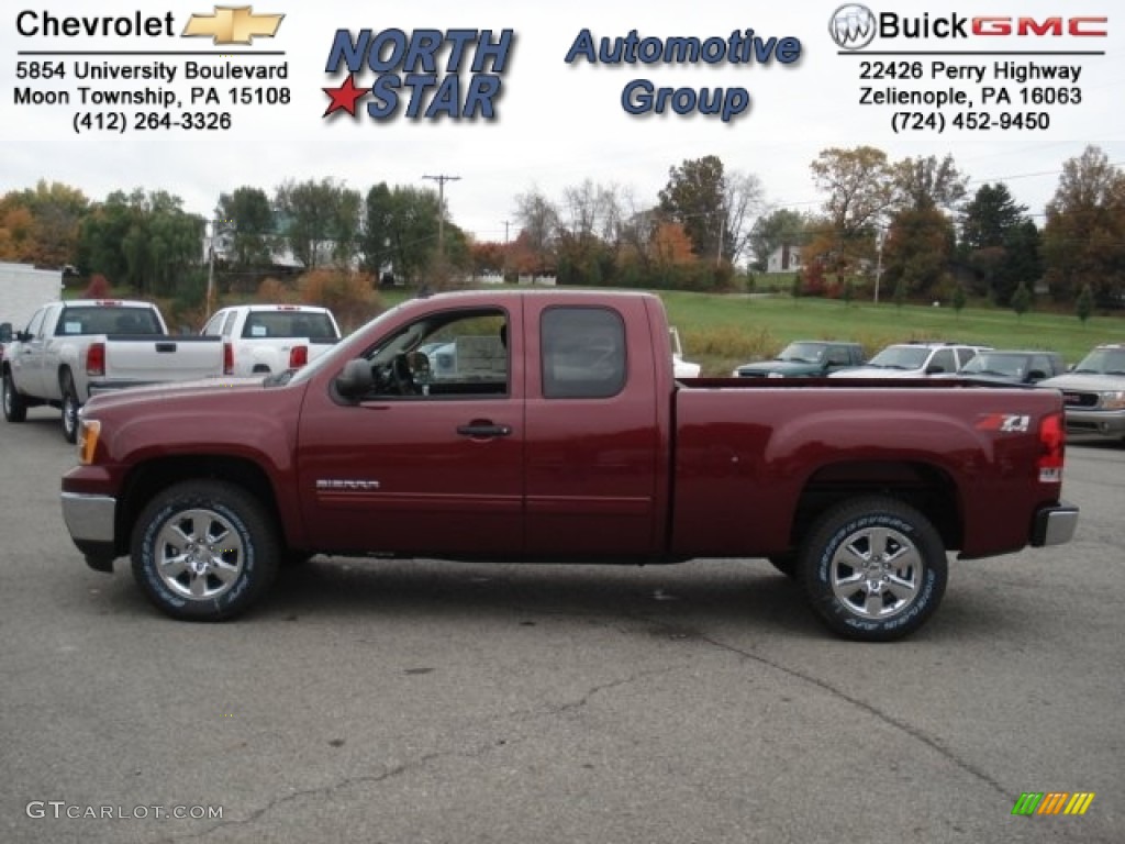 2013 Sierra 1500 SLE Extended Cab 4x4 - Sonoma Red Metallic / Ebony photo #1