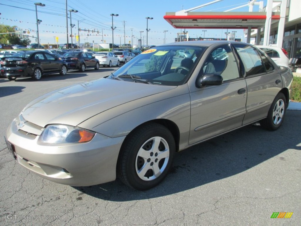 2004 Cavalier LS Sedan - Sandrift Metallic / Neutral photo #1