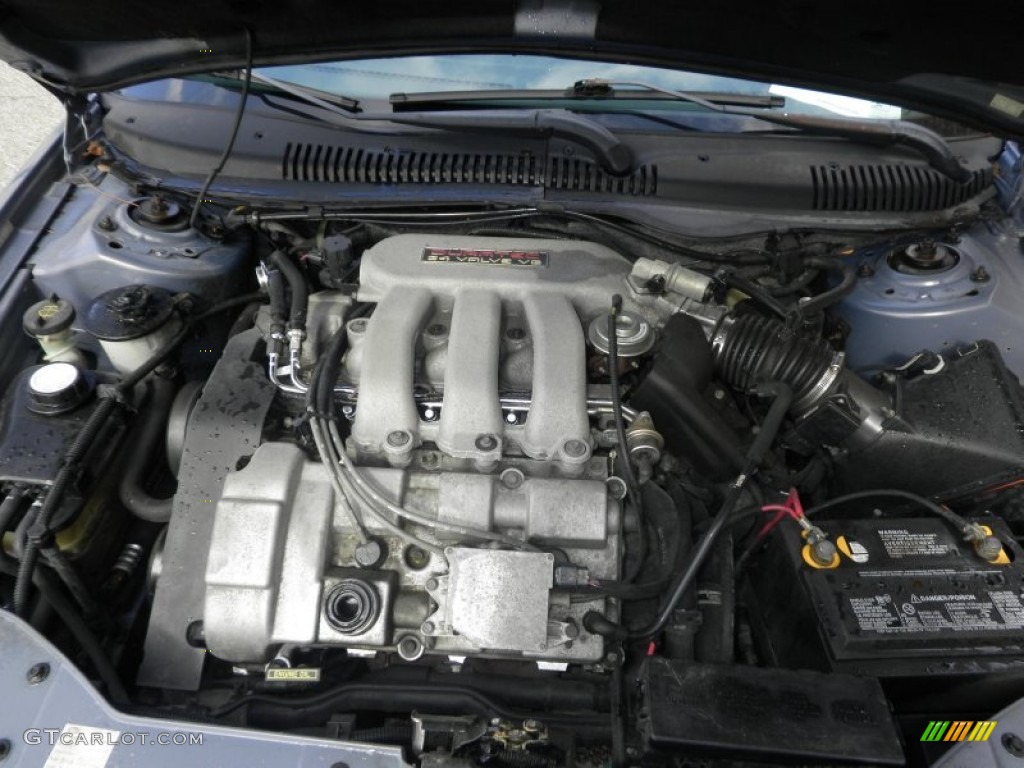 1999 Taurus SE - Graphite Blue Metallic / Medium Graphite photo #16