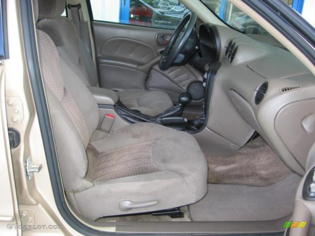 2005 Grand Am SE Sedan - Champagne Beige Metallic / Dark Taupe photo #7