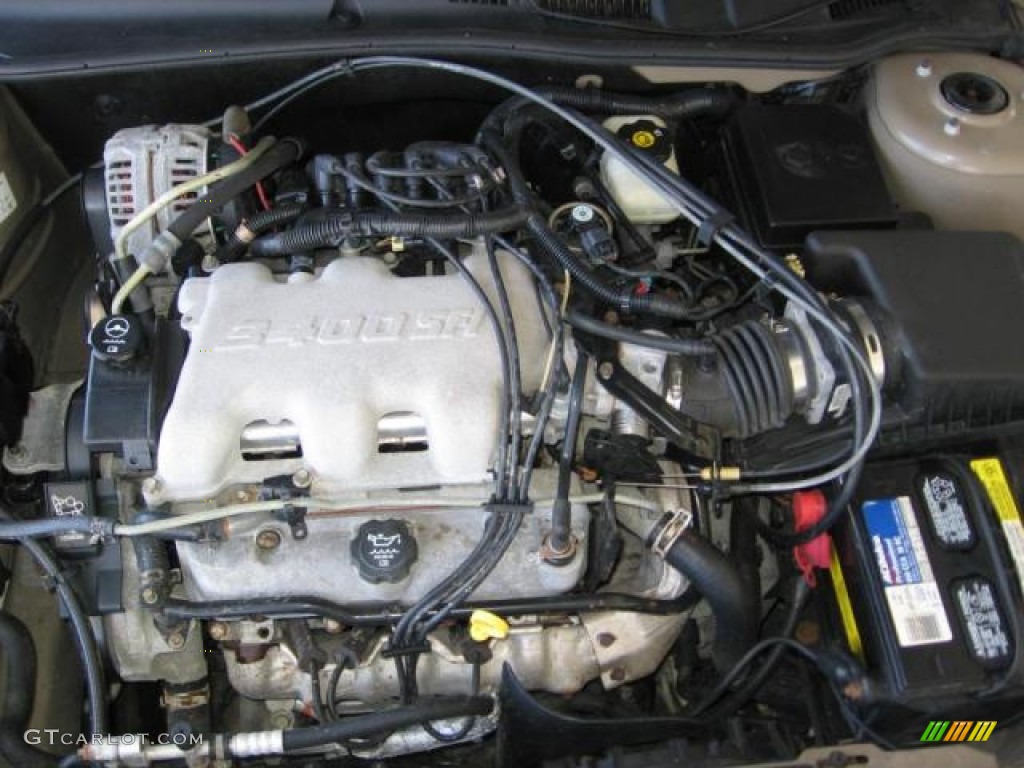 2005 Grand Am SE Sedan - Champagne Beige Metallic / Dark Taupe photo #18