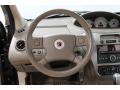 Beige 2006 Saturn ION 3 Sedan Steering Wheel