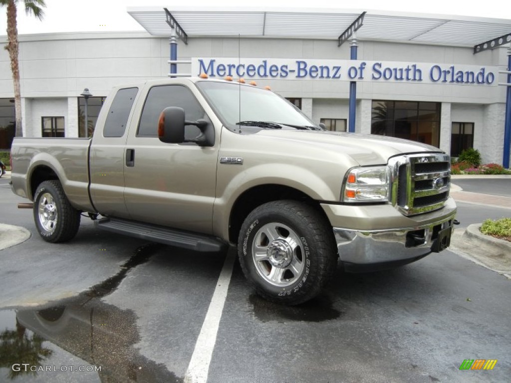 2006 F350 Super Duty Lariat SuperCab 4x4 - Arizona Beige Metallic / Tan photo #1