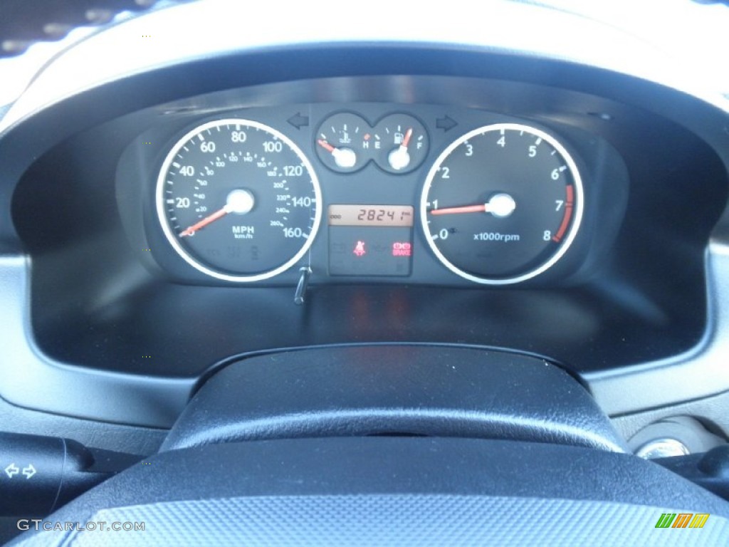 2003 Tiburon GT V6 - Super Silver / Black photo #12