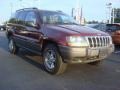 2002 Dark Garnet Red Pearlcoat Jeep Grand Cherokee Laredo  photo #1