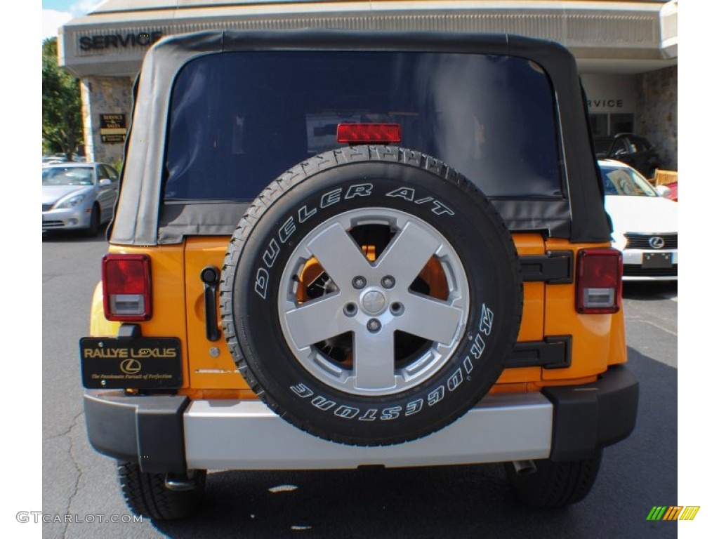 2012 Wrangler Sahara 4x4 - Dozer Yellow / Black photo #5