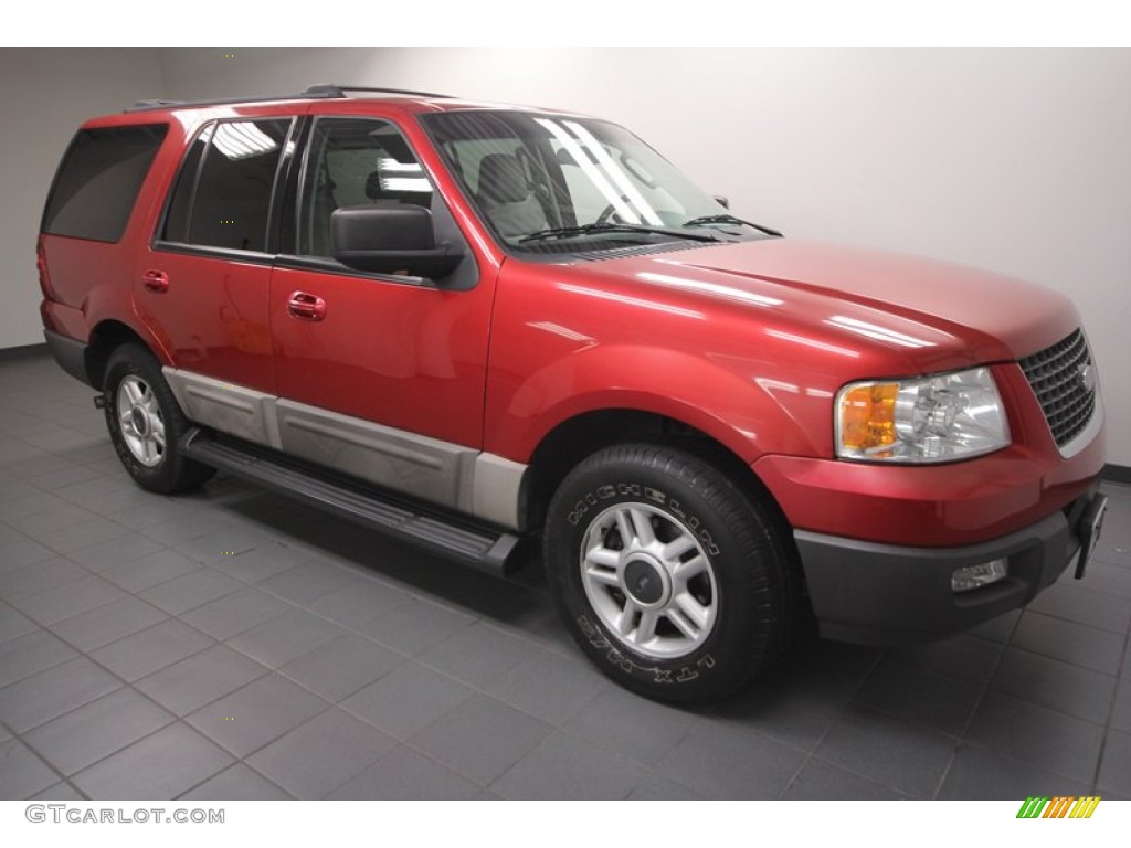 Laser Red Tinted Metallic 2003 Ford Expedition XLT Exterior Photo #72460491