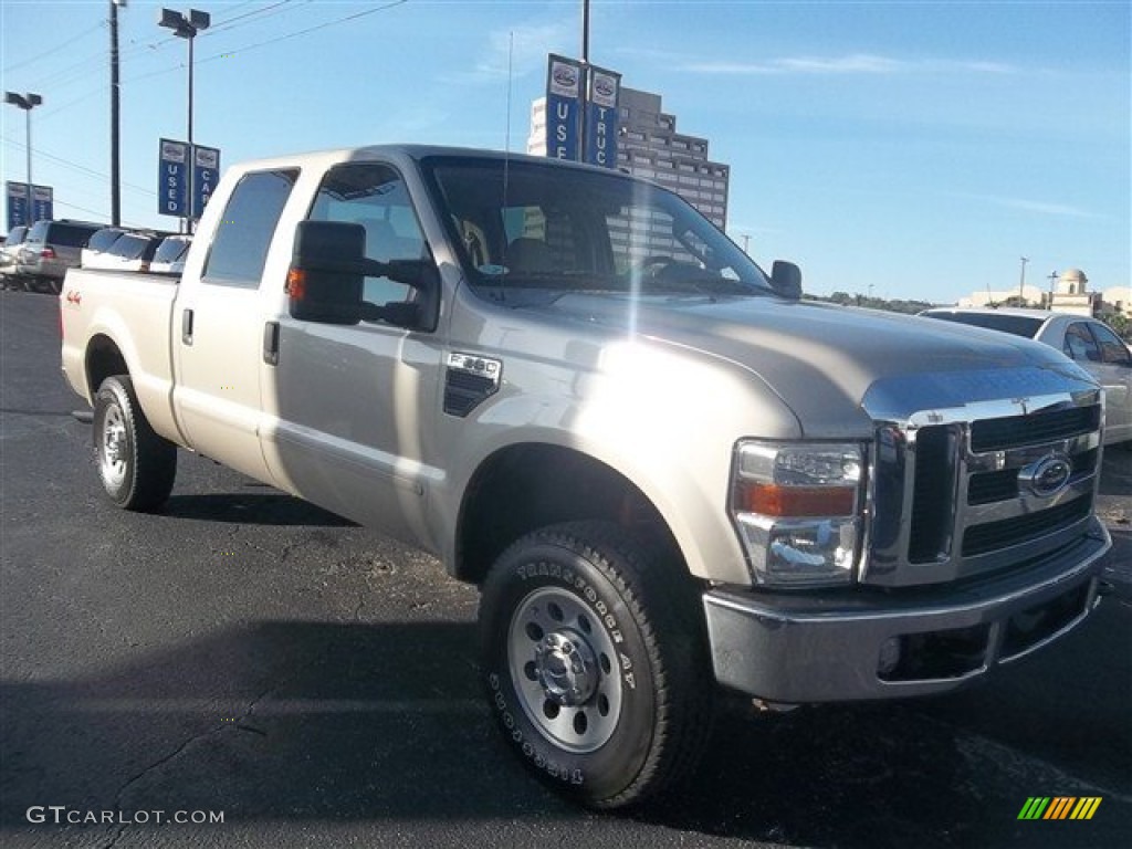 2009 F250 Super Duty XLT Crew Cab 4x4 - Pueblo Gold Metallic / Medium Stone photo #1