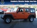Crush Orange 2013 Jeep Wrangler Unlimited Sport 4x4