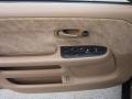 2004 Honda CR-V Saddle Interior Door Panel Photo
