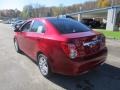 2013 Crystal Red Tintcoat Chevrolet Sonic LT Sedan  photo #4