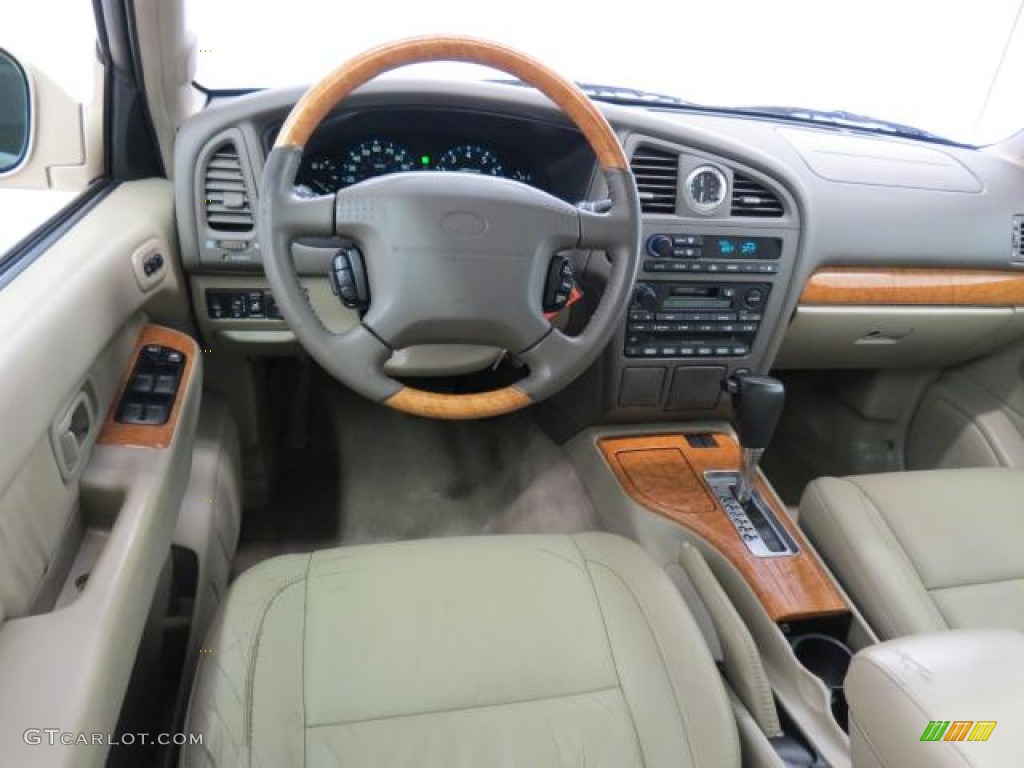 2001 QX4  - Tuscan Beige Metallic / Stone Beige photo #5