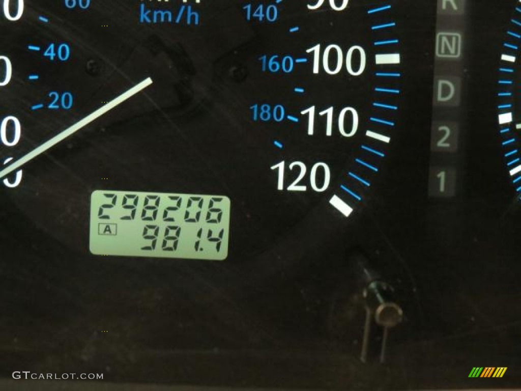 2001 QX4  - Tuscan Beige Metallic / Stone Beige photo #13