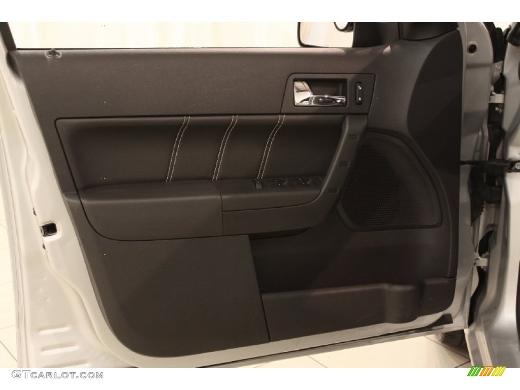 2010 Ford Focus SEL Sedan Charcoal Black Door Panel Photo #72666535