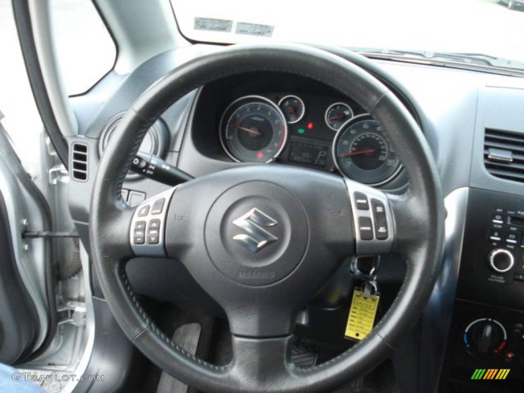 2010 Suzuki SX4 Sedan Black Steering Wheel Photo #72671625