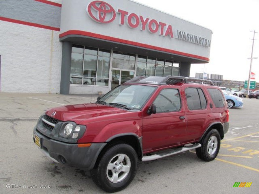 2004 Xterra XE 4x4 - Thermal Red Metallic / Gray photo #1