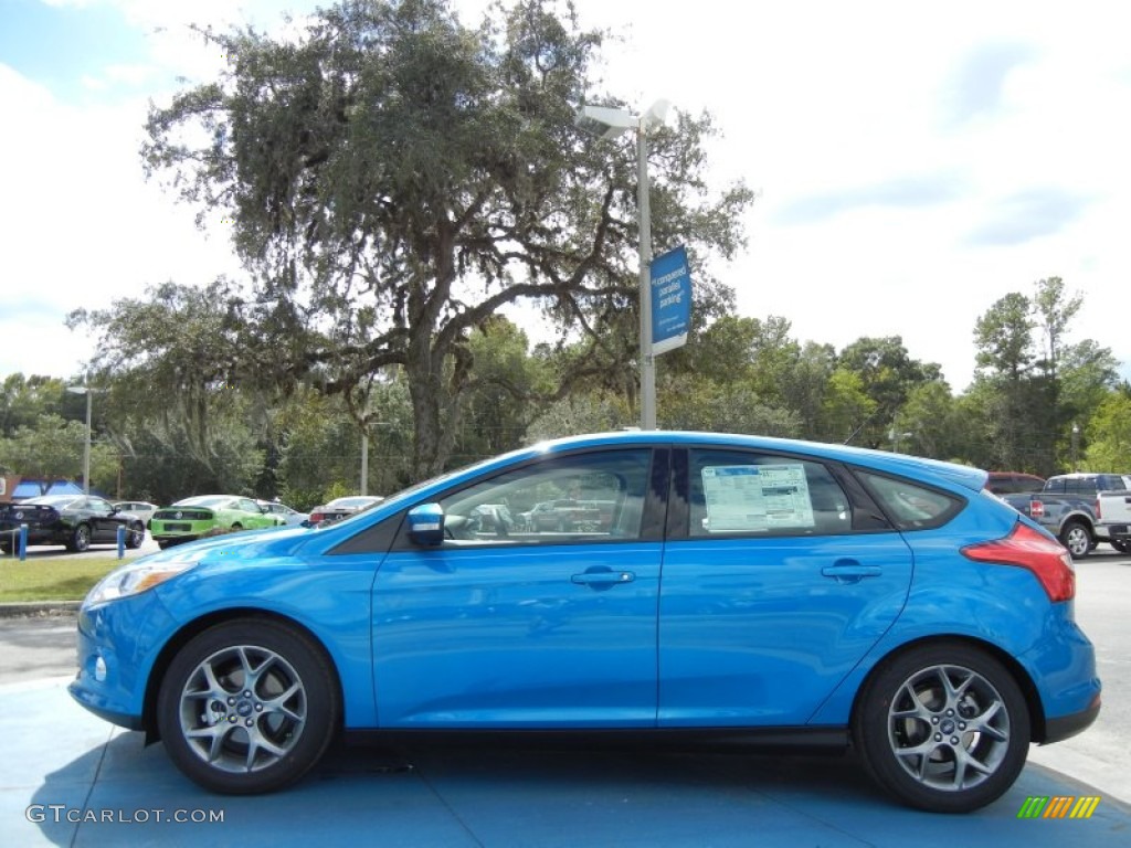 Blue Candy 2013 Ford Focus SE Hatchback Exterior Photo #72685483