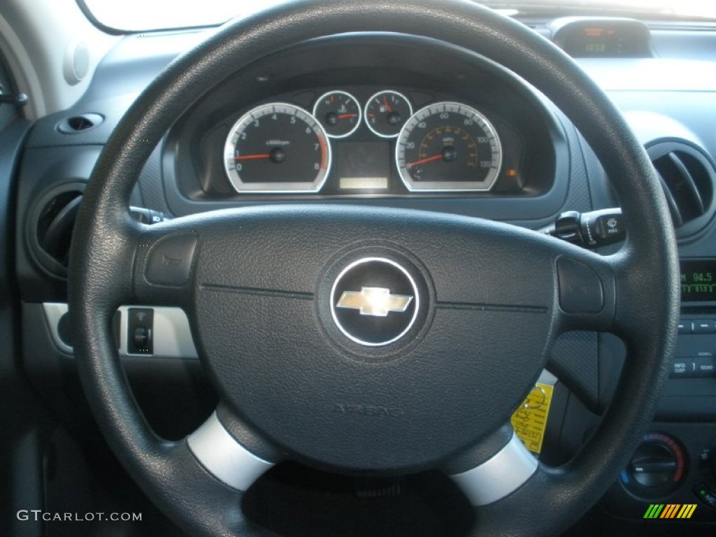 2011 Chevrolet Aveo LT Sedan Charcoal Steering Wheel Photo #72729281