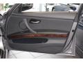 Black 2009 BMW 3 Series 328xi Sedan Door Panel