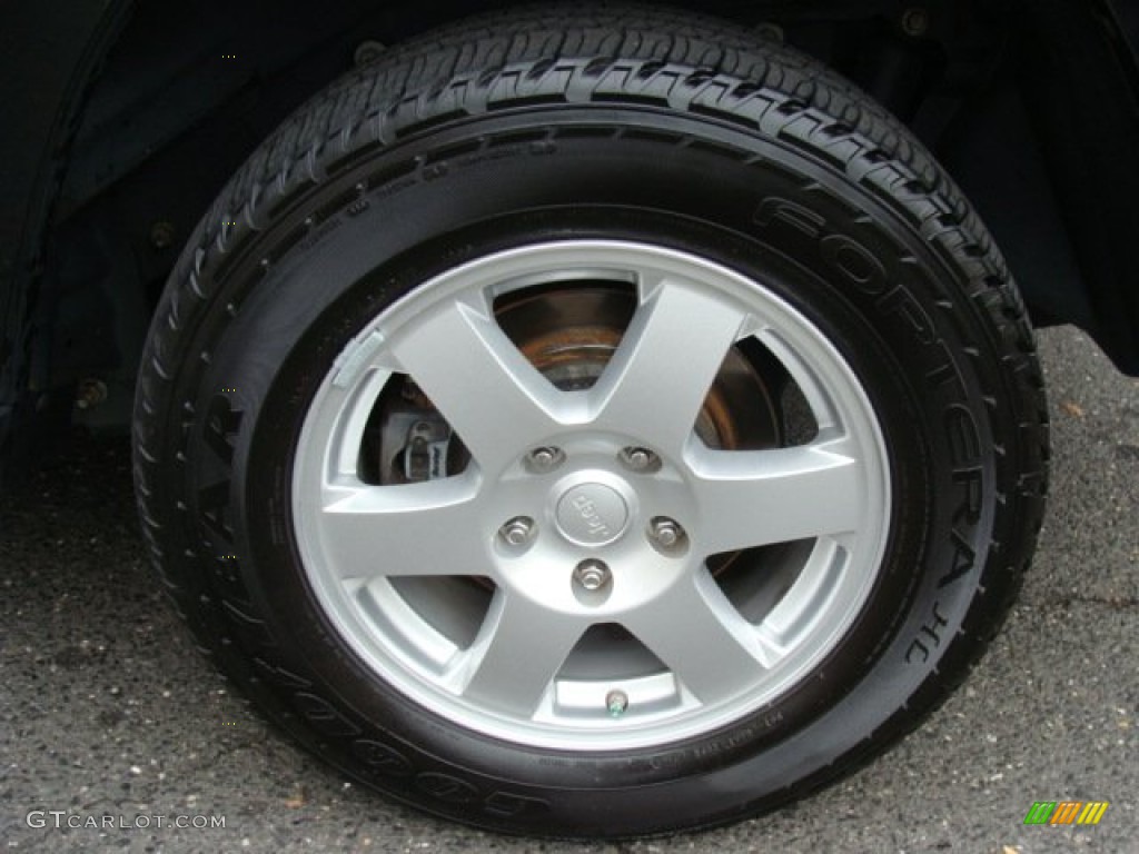 2010 Jeep Grand Cherokee Laredo 4x4 Wheel Photo #72753788