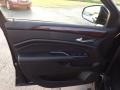Ebony/Ebony Door Panel Photo for 2013 Cadillac SRX #72773089