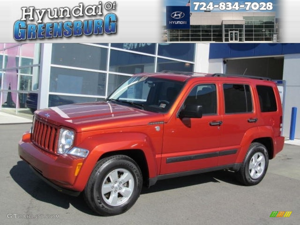 2009 Liberty Sport 4x4 - Sunburst Orange Pearl / Dark Slate Gray photo #1