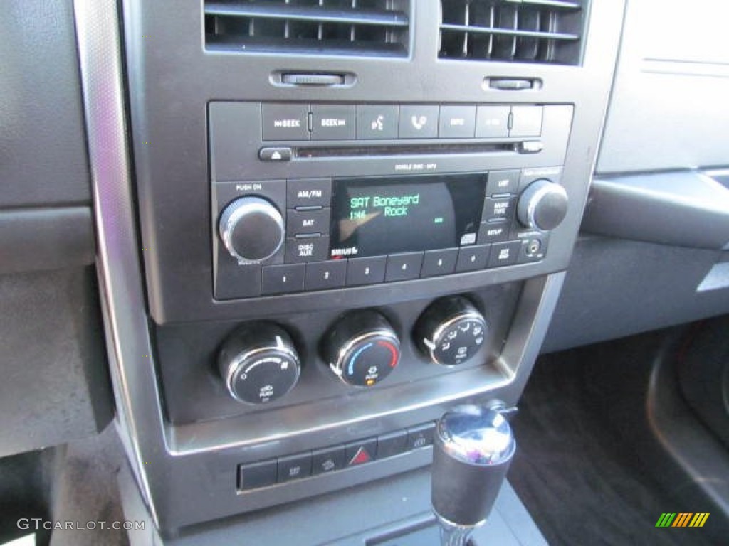 2009 Liberty Sport 4x4 - Sunburst Orange Pearl / Dark Slate Gray photo #15