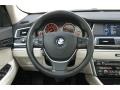 2011 BMW 5 Series Ivory White/Black Interior Steering Wheel Photo