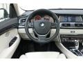 2011 BMW 5 Series Ivory White/Black Interior Dashboard Photo