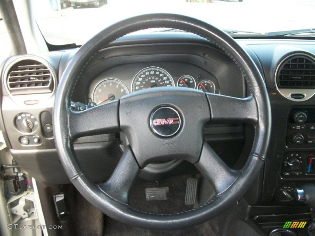 2009 GMC Envoy SLE 4x4 Ebony Steering Wheel Photo #72865782