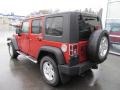 2009 Sunburst Orange Pearl Jeep Wrangler Unlimited X 4x4  photo #9