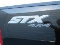 2005 Black Ford F150 STX SuperCab 4x4  photo #17