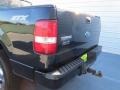 2005 Black Ford F150 STX SuperCab 4x4  photo #21