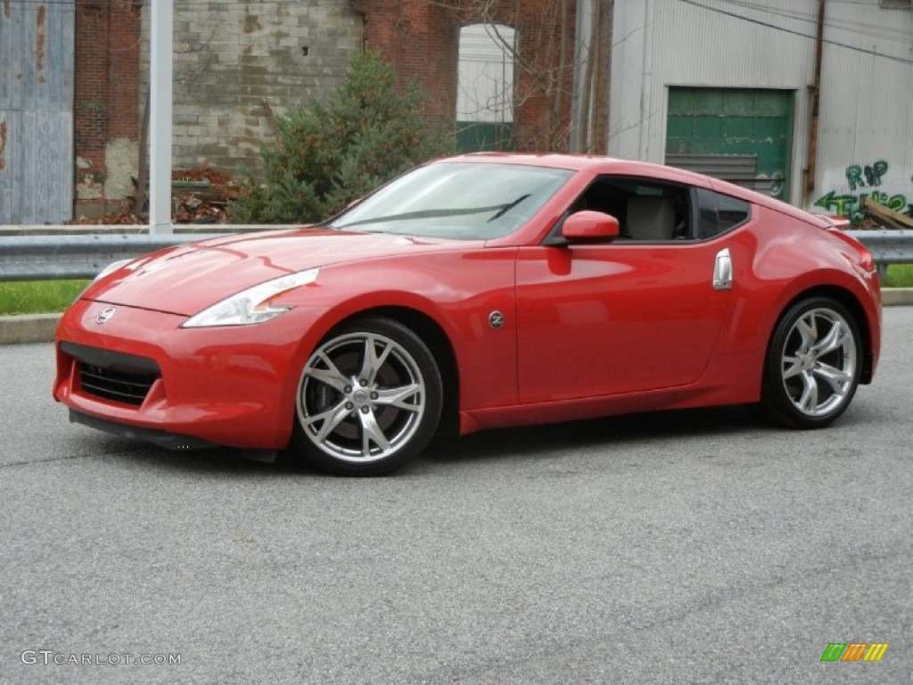 Solid Red 2009 Nissan 370Z Sport Touring Coupe Exterior Photo #73018111