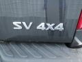 2011 Nissan Frontier SV Crew Cab 4x4 Badge and Logo Photo