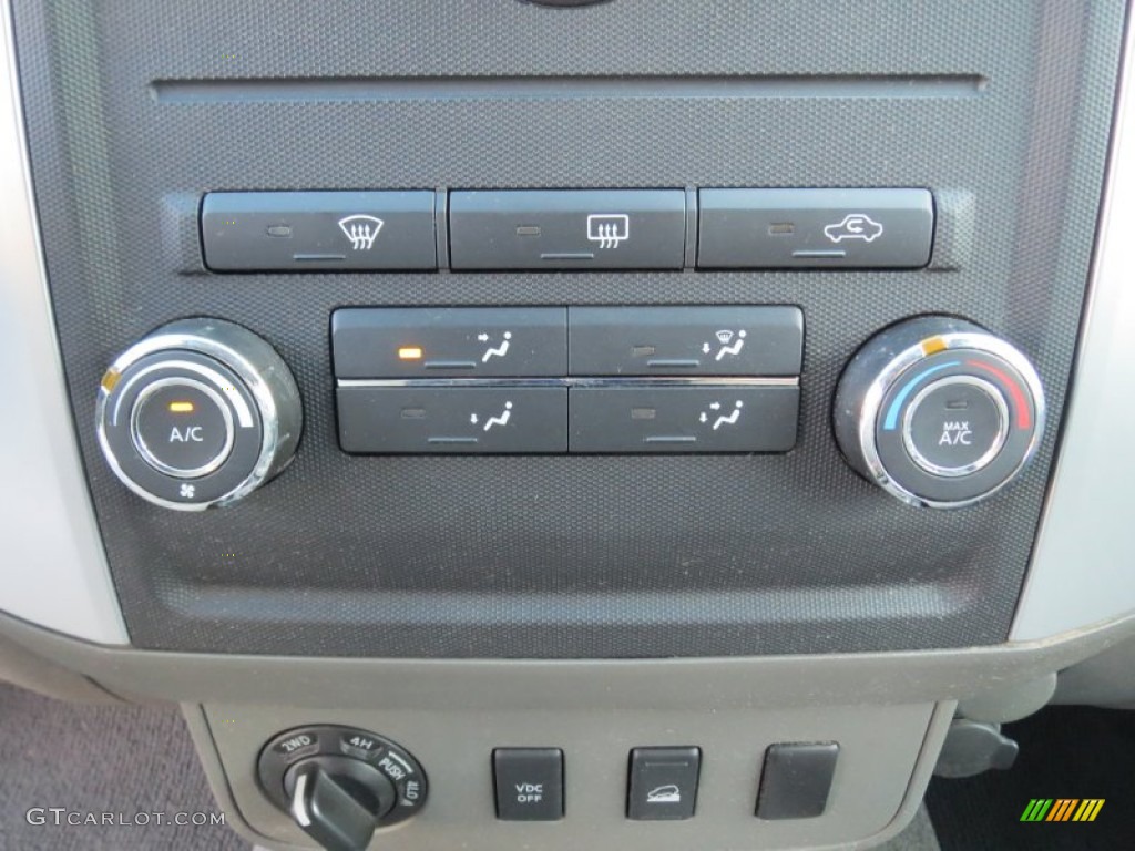 2011 Nissan Frontier SV Crew Cab 4x4 Controls Photo #73018684