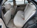 1999 Saturn S Series Tan Interior Rear Seat Photo