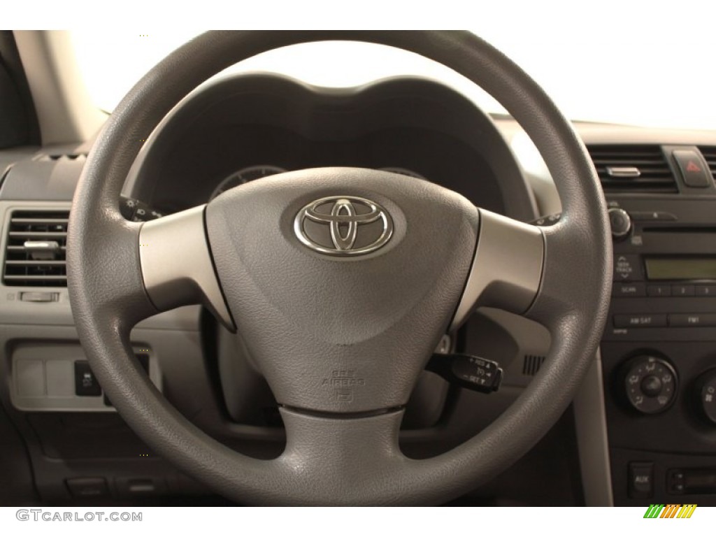 2010 Toyota Corolla LE Ash Steering Wheel Photo #73049527