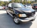 2002 Black Ford F150 XLT SuperCab  photo #1