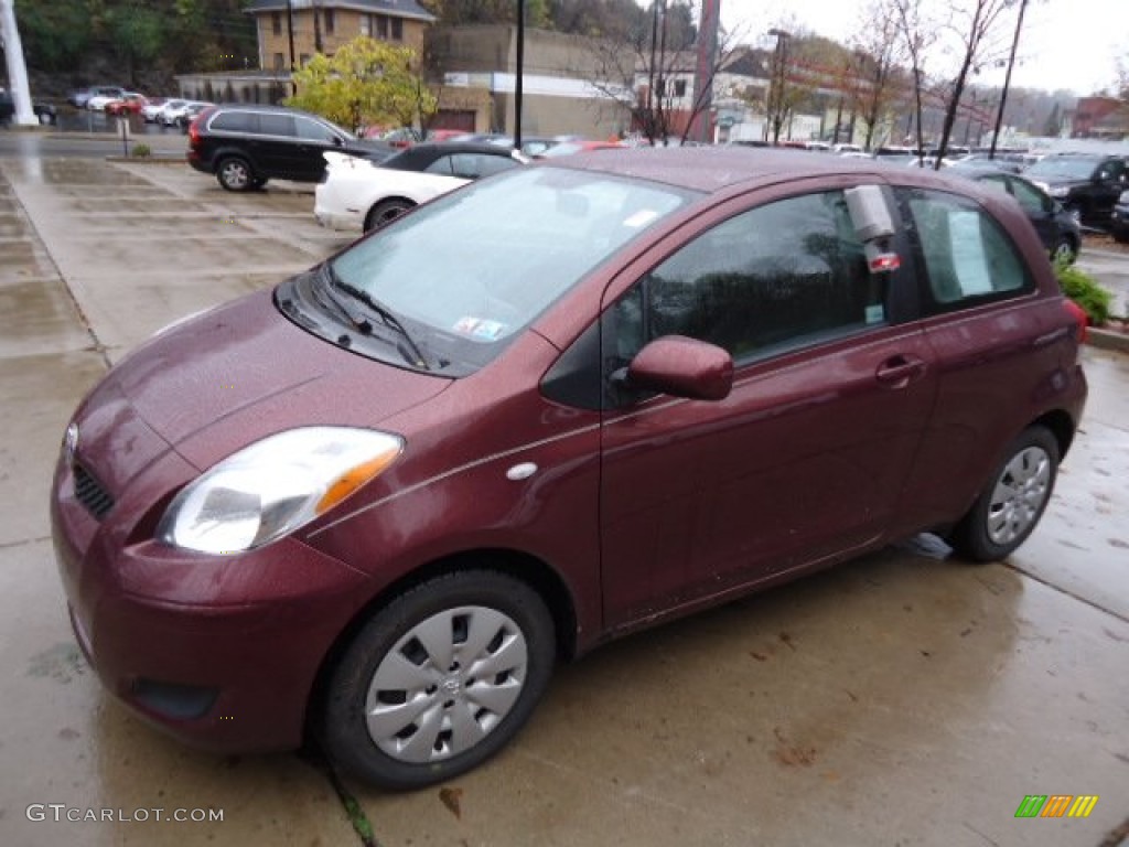 2010 Yaris 3 Door Liftback - Carmine Red Metallic / Dark Charcoal photo #2
