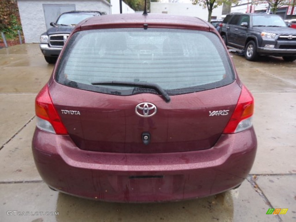 2010 Yaris 3 Door Liftback - Carmine Red Metallic / Dark Charcoal photo #11