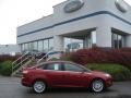 2013 Ruby Red Ford Focus Titanium Sedan  photo #1