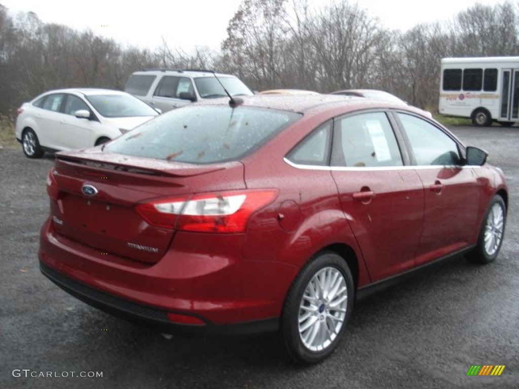 Ruby Red 2013 Ford Focus Titanium Sedan Exterior Photo #73081596