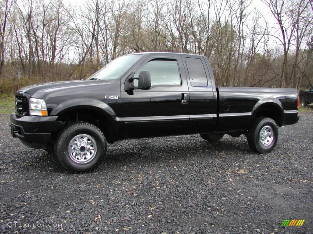 2002 F250 Super Duty XLT SuperCab 4x4 - Black / Medium Flint photo #2