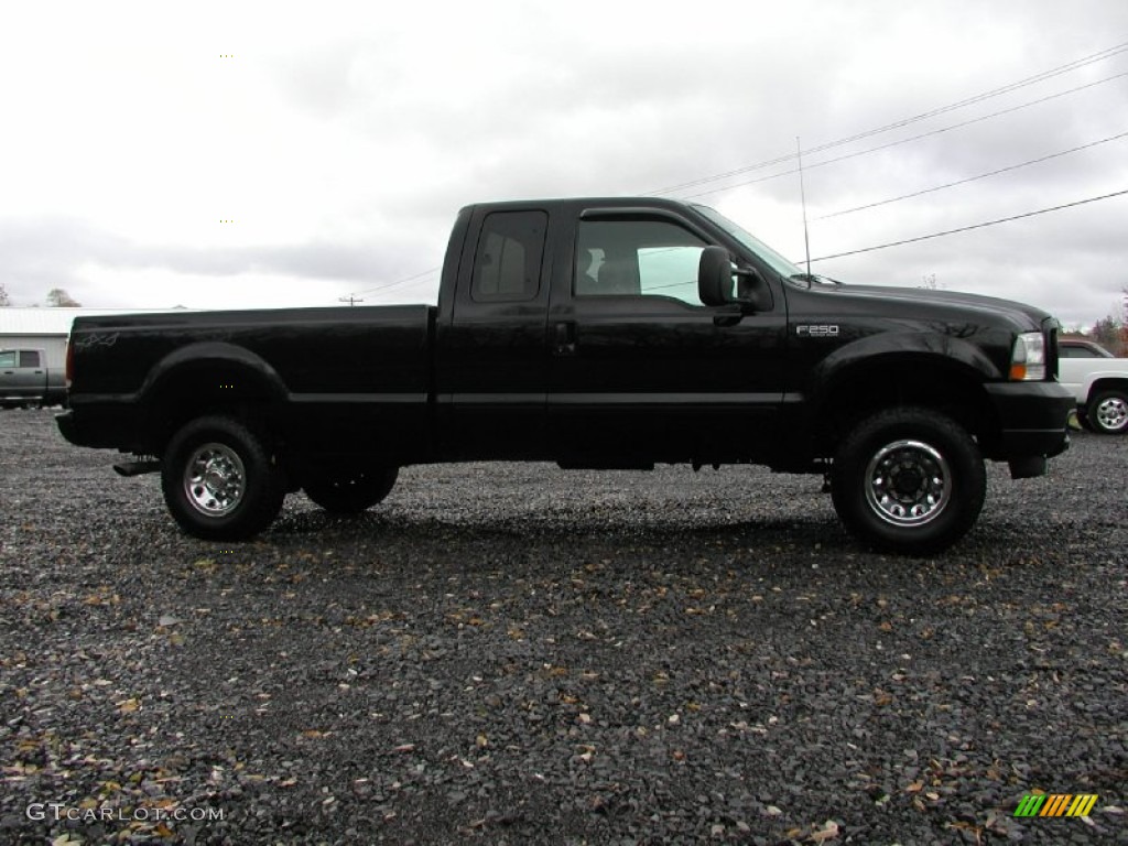 2002 F250 Super Duty XLT SuperCab 4x4 - Black / Medium Flint photo #17